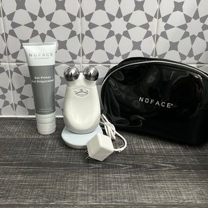 NuFACE White Facial Toning Device with Silver Spheres and Black Travel Pouch